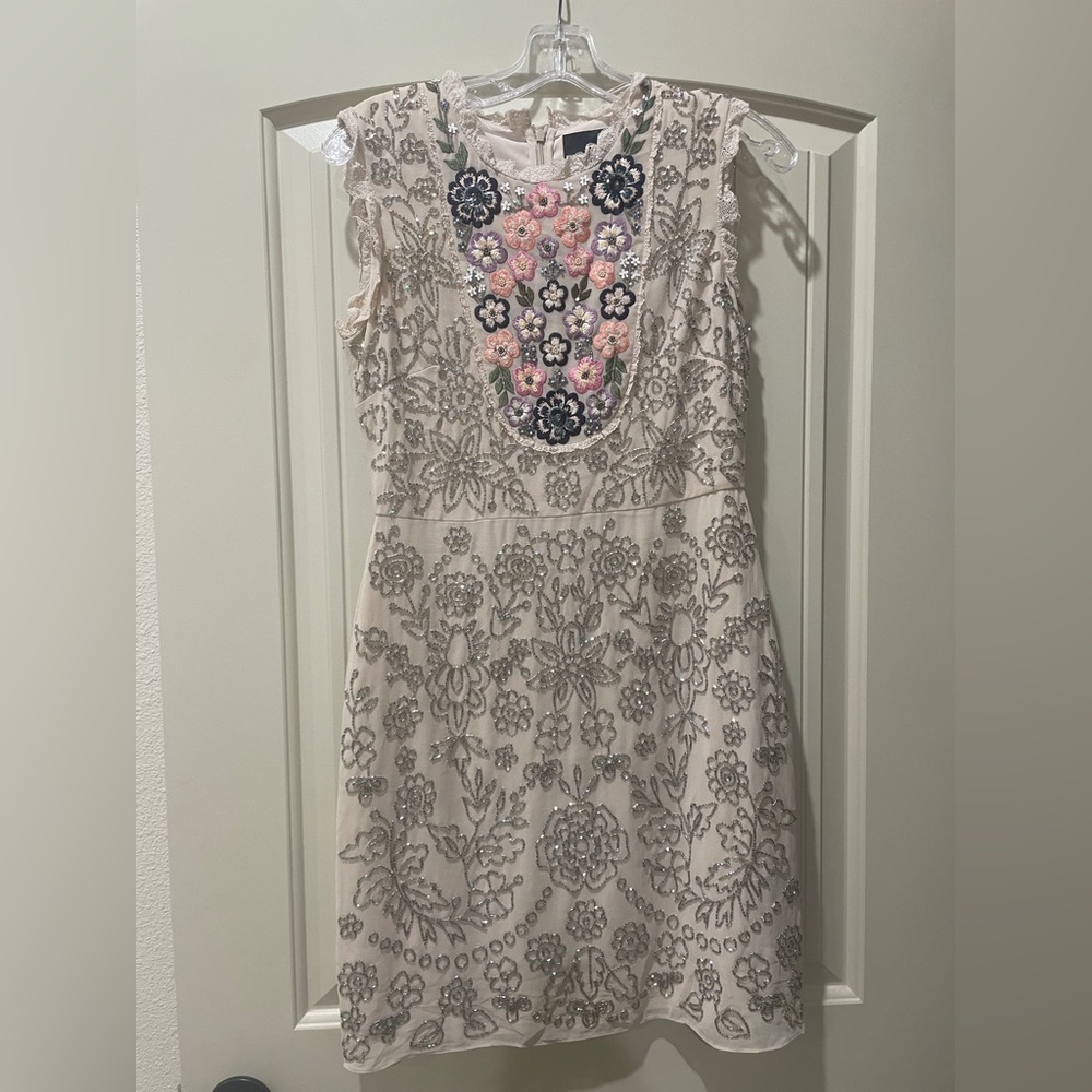 Needle and Thread Dress
Size US 6
Beaded and embroidered 
Only worn one time